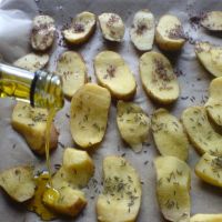 Kartoffelscheiben mit Olivenöl Kartoffelscheiben mit Olivenöl